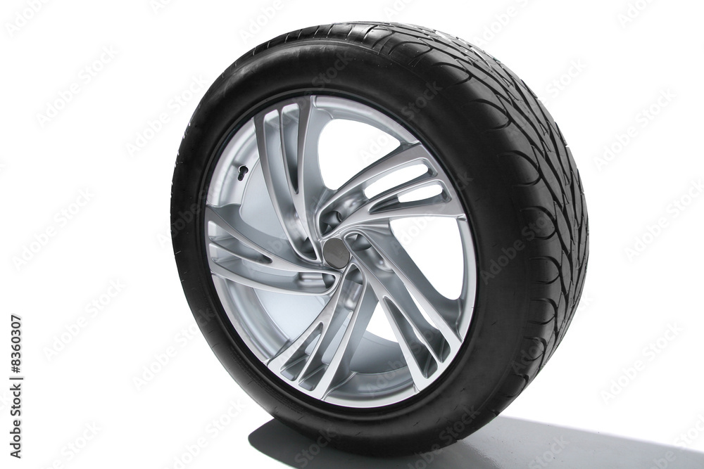 Obraz premium Wheel with steel rim over the white background