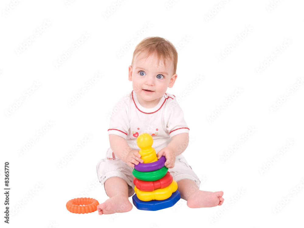 portrait of a beautiful baby girl playing with a toy portrait of a beautiful baby girl playing with a toy