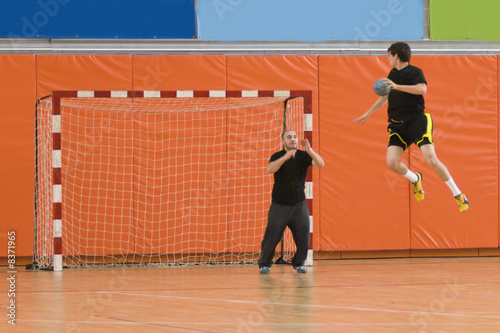 handball player jumping with the ball