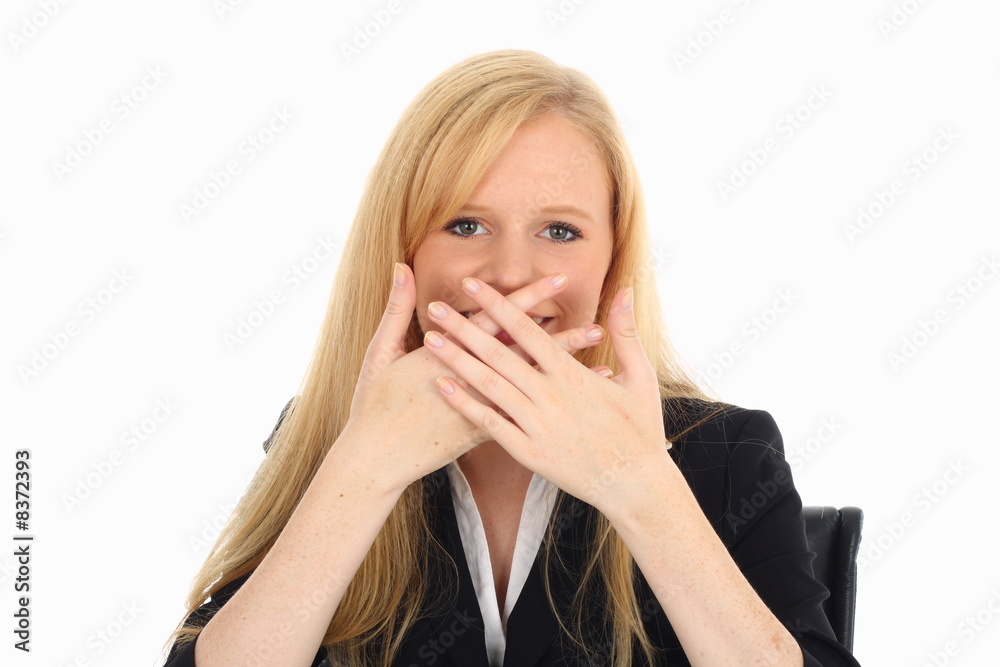 Young Businesswoman posing - hiding her mouth Young Businesswoman posing - hiding her mouth