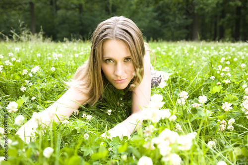 Sexy Woman Laying On The Grass