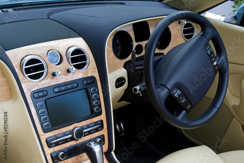looking in at expensive convertible car dashboard © Christopher Nolan