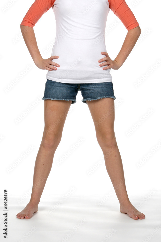 pretty teen's flat, thin stomach and toned bare legs Stock Photo | Adobe  Stock