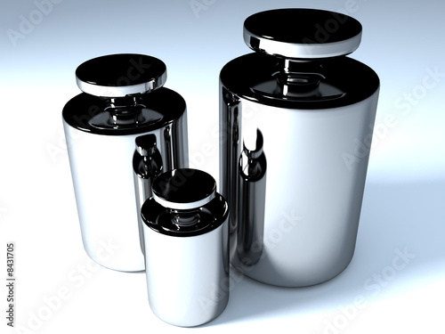 Three chromium-plated glossy weights of different sizes 3d