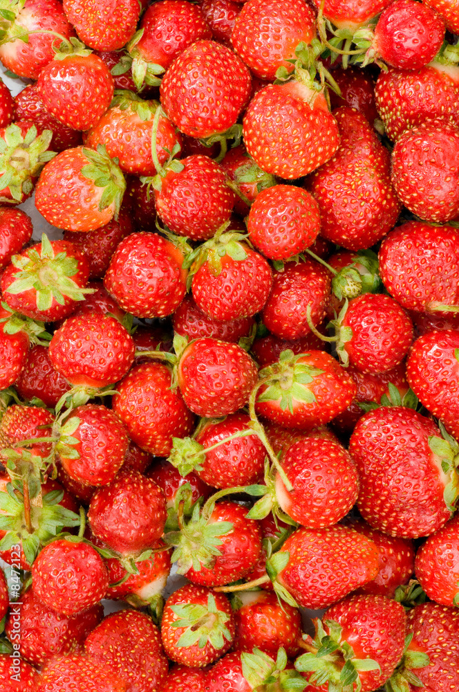 Lots of strawberries arranged as the background Lots of strawberries arranged as the background