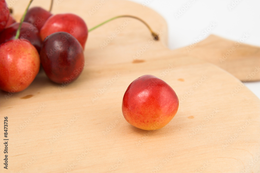 Cherry; object on a board Cherry; object on a board
