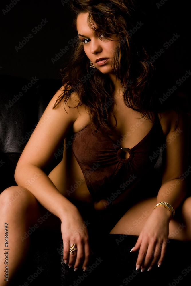 Brunette is waiting on the bench Brunette is waiting on the bench