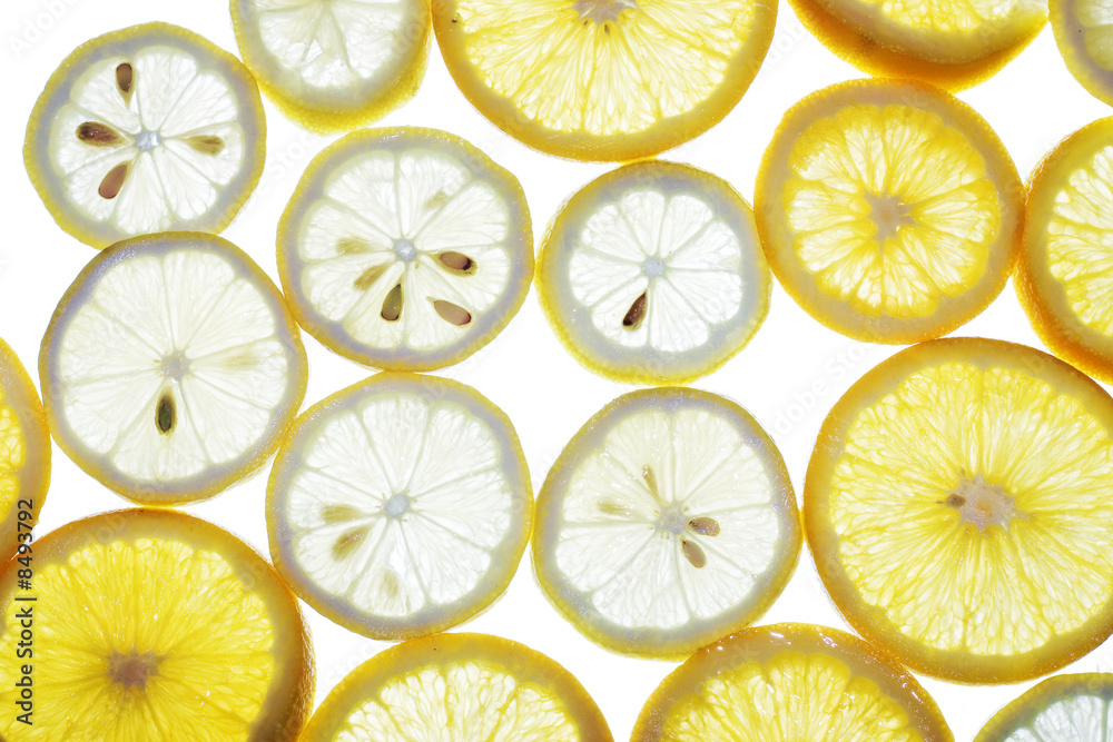 Sliced orange and lemon isolated on white background. Sliced orange and lemon isolated on white background.