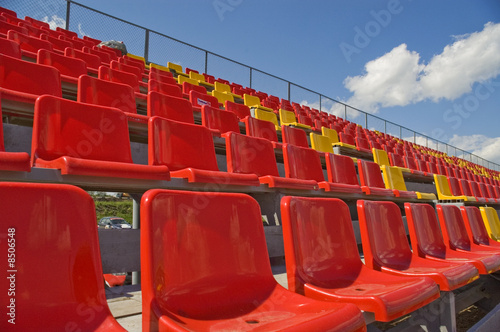 Lines of color seats.