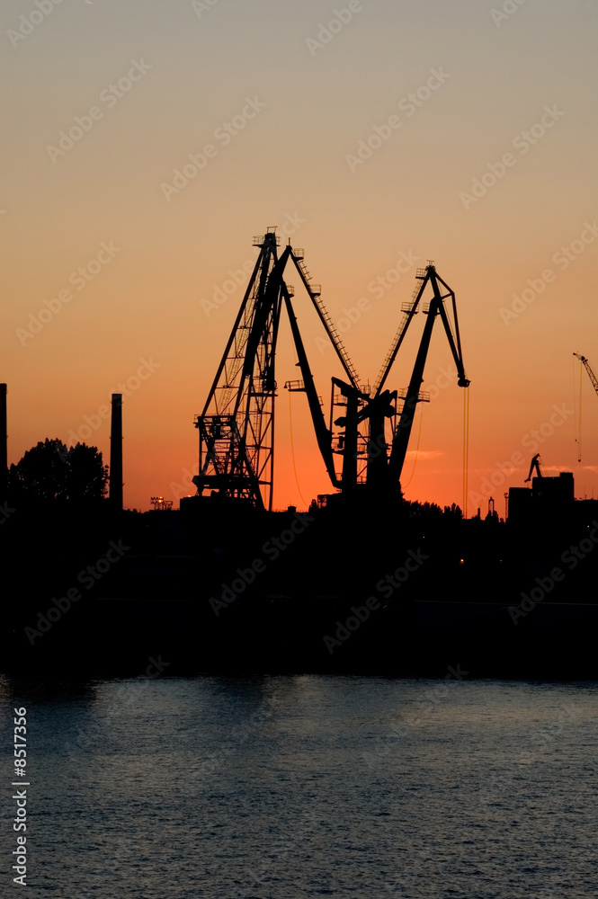 Elevating cranes in port