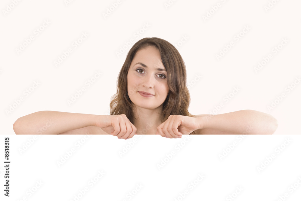 Beautiful woman holding empty gray board Beautiful woman holding empty gray board