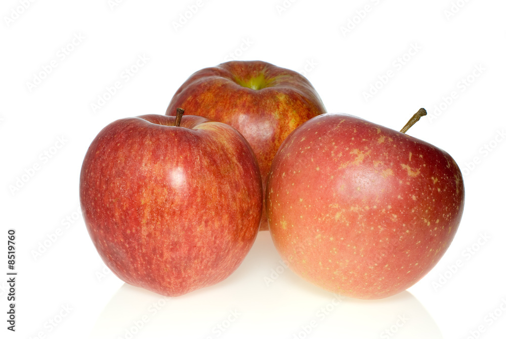 Three red apples of different breeds Three red apples of different breeds