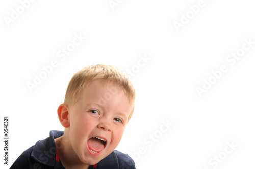 Cute laughing young boy