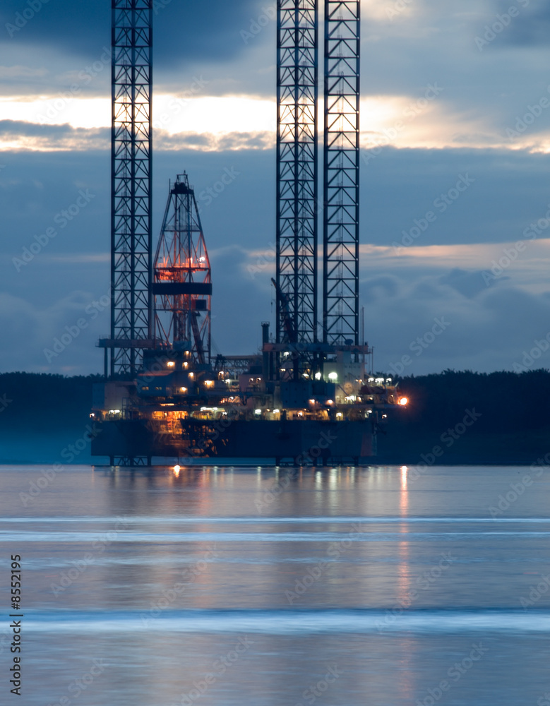 Oil Exploration Rig At Dawn