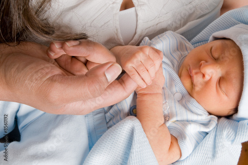 baby's grasping hand