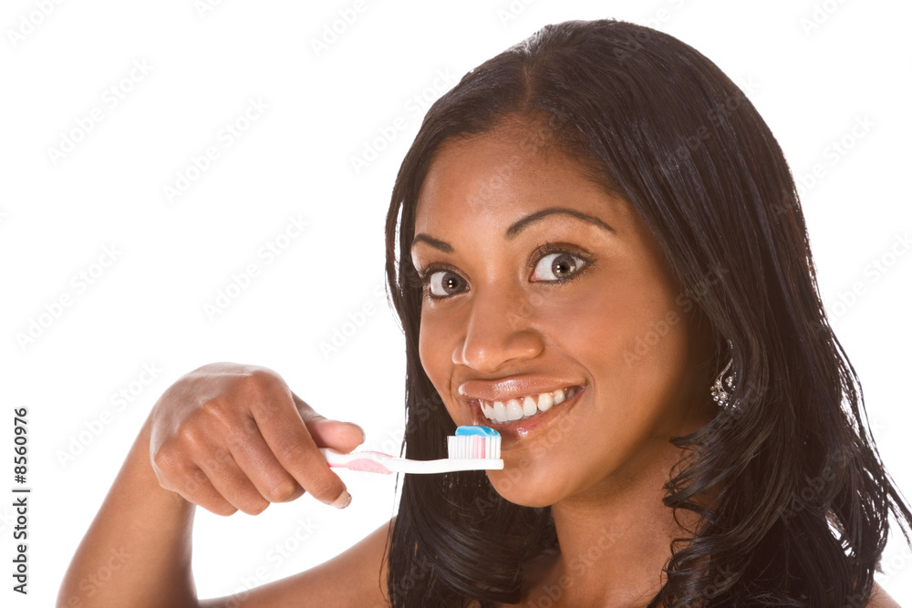 Oral hygiene, Afro-American girl with toothbrush Oral hygiene, Afro-American girl with toothbrush