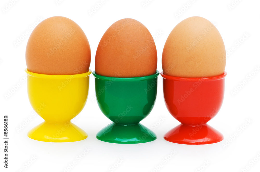 Brown eggs in holder isolated on white