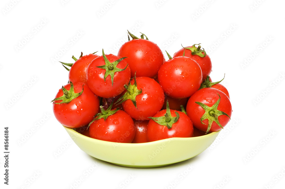 Wet whole tomatos arranged isolated on white Wet whole tomatos arranged isolated on white