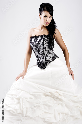 Young bride in black and white wedding dress