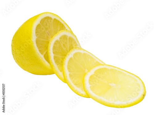 Isolated lemon with slices against the white background