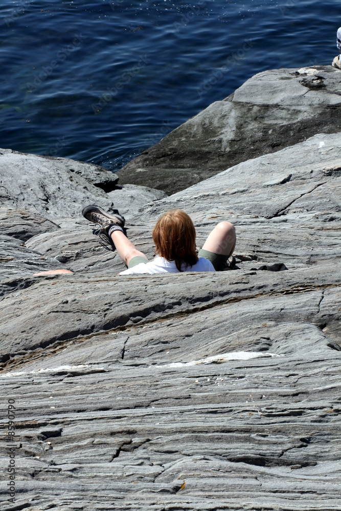 Man Fallen on Oceanside Cliff