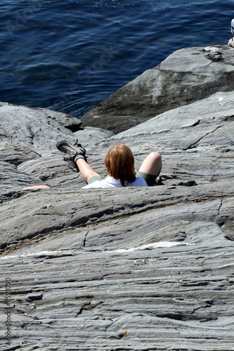 Man Fallen on Oceanside Cliff