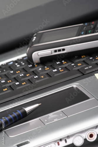 Notebook, phone, business technology © fox17