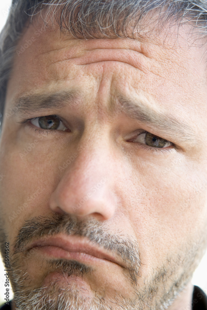 Head shot of sad man Head shot of sad man
