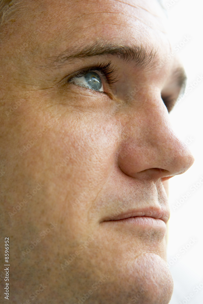 Head shot of man thinking Head shot of man thinking