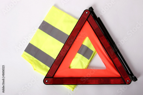 warning triangle and yellow waistcoat