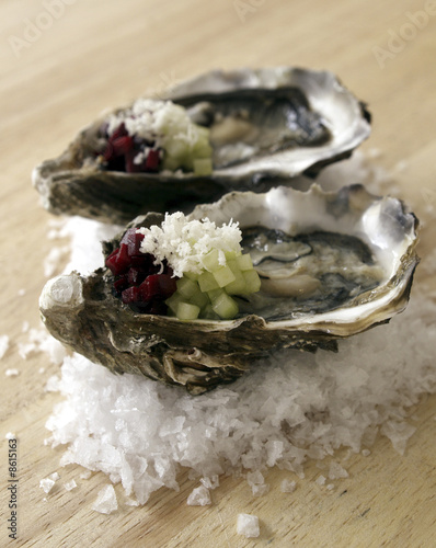 Oysters with cucumber , beetroot and horseradish.