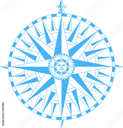 Compass wind rose with  Fleur-De-Lys and sun face in center