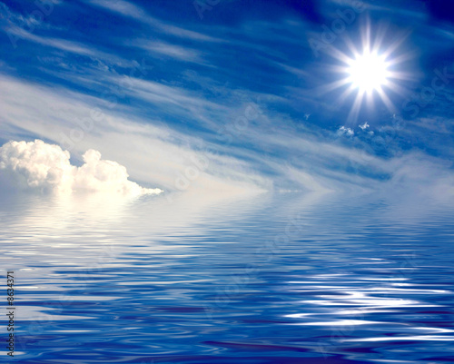 beautiful sun over clouds and water