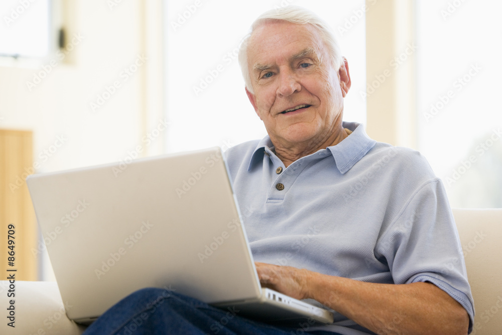 senior,man,laptop,computer,at home,sofa,browsing,surfing,interne senior,man,laptop,computer,at home,sofa,browsing,surfing,interne
