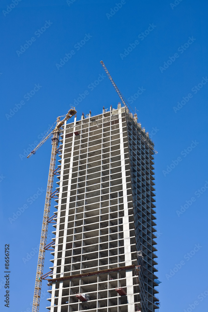 Fototapeta premium Cranes and building construction
