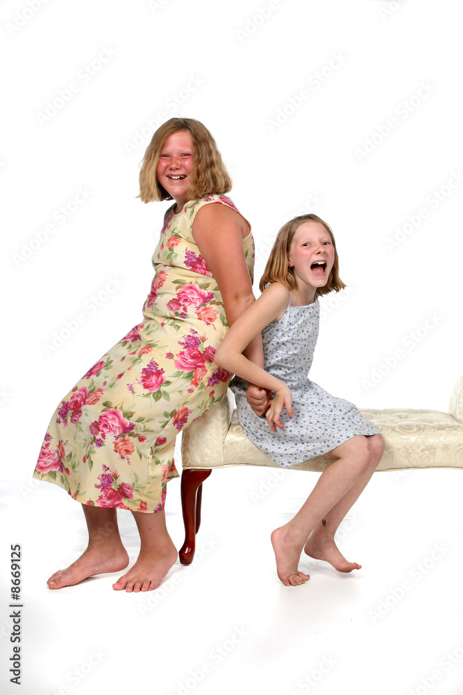 sisters sitting on bench