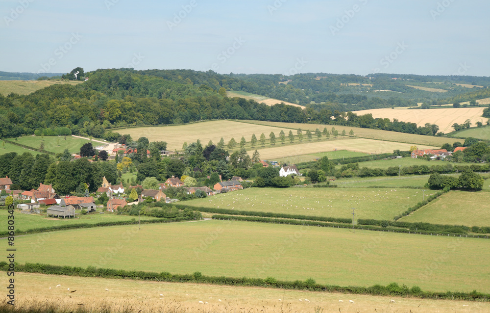 An English Summer Landscape with a Village in the Valley