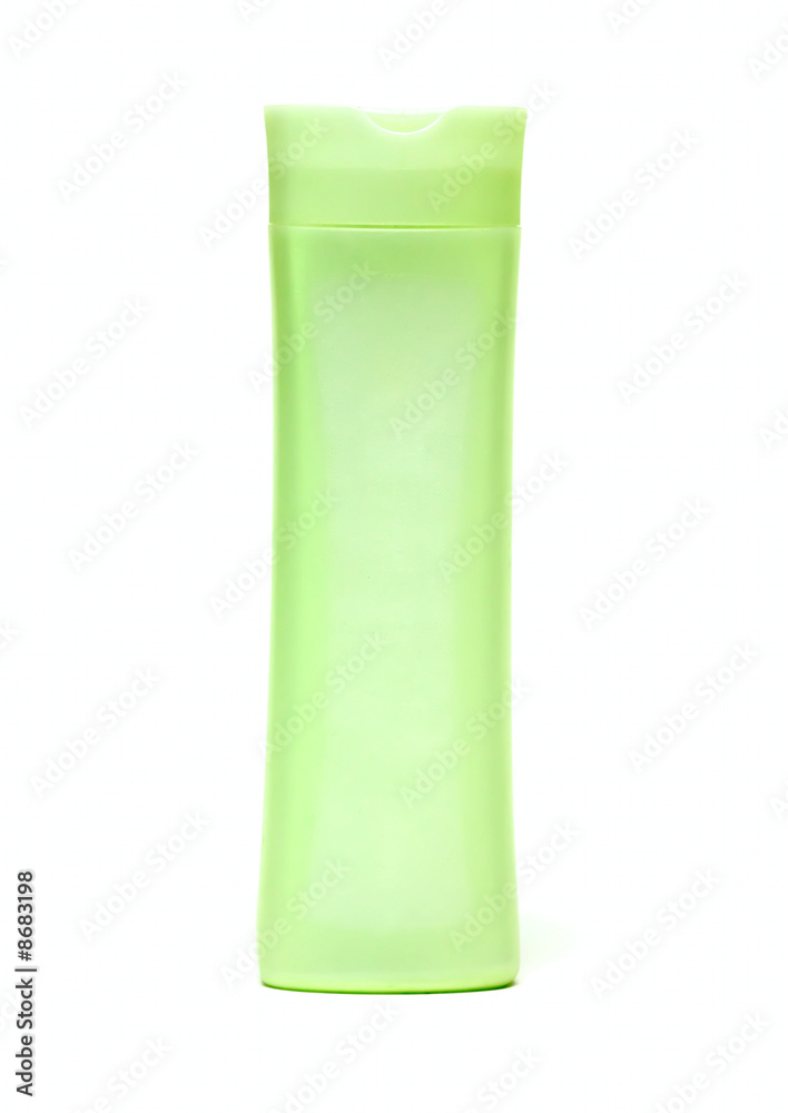 Green cosmetic jar isolated on white