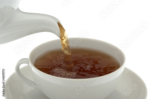 tea series on white, pouring tea close