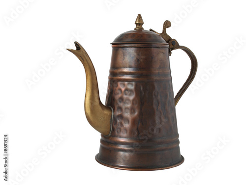Old brazen coffee-pot standing on white background