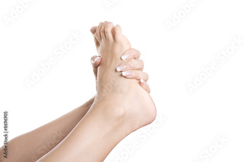 Foot and hand isolated on white. © Sergejs Nescereckis