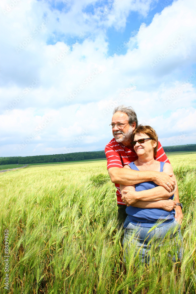 Senior couple in a field Senior couple in a field