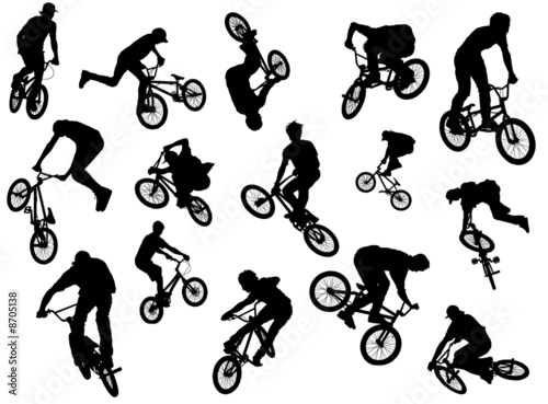 Fotografiet Black silhouettes of bmx and mtb riders