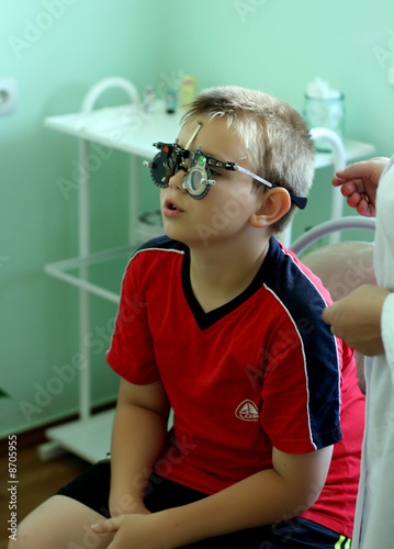 child at doctor oculist