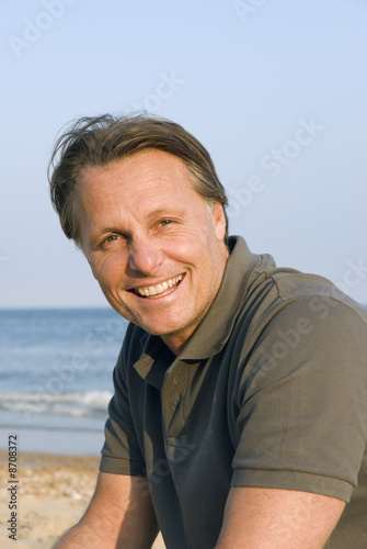 A happy smiling forties man