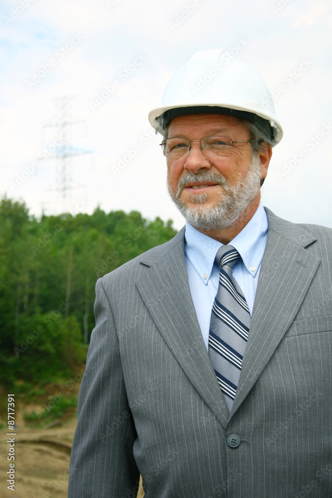 Senior man with white hard hat Senior man with white hard hat