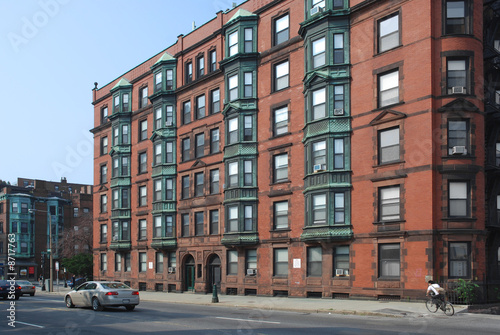 street scene with old apartment building