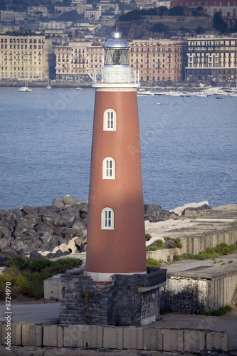 Lighthouse at the Entrance of harbour in Naples, Italy
