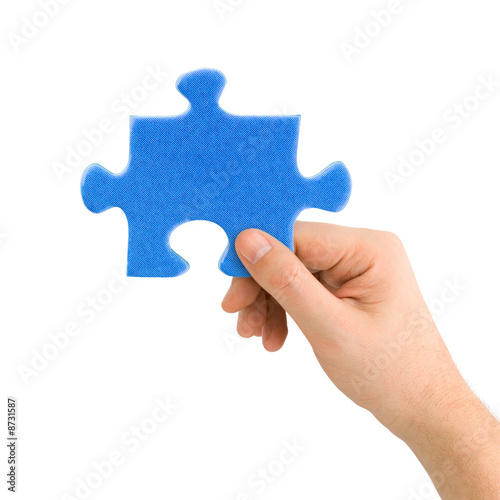 Hand and puzzle