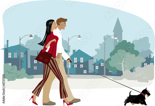 Couple walking a dog